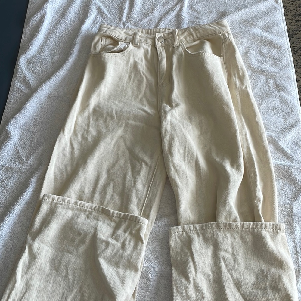 baggy cream colored jeans 
size M